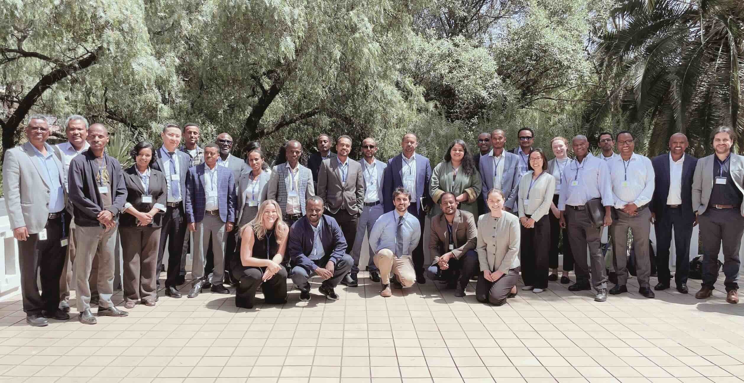 A large group of people pose for a photo